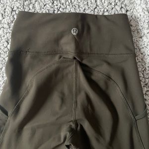 Lululemon dark olive green leggings with pockets (invigorate high rise tight)